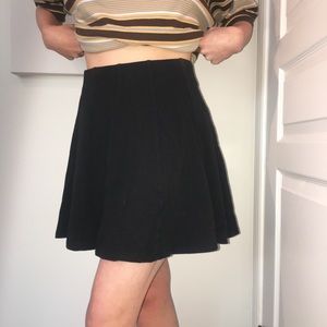 Black skirt , mid tight length
